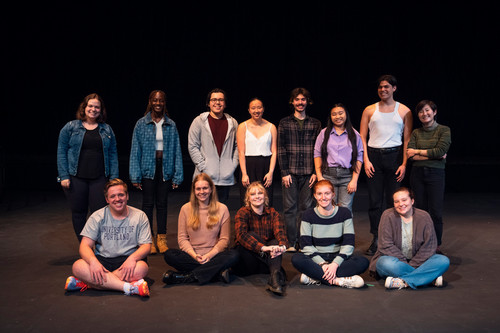 The cast and crew of TBA on the stage