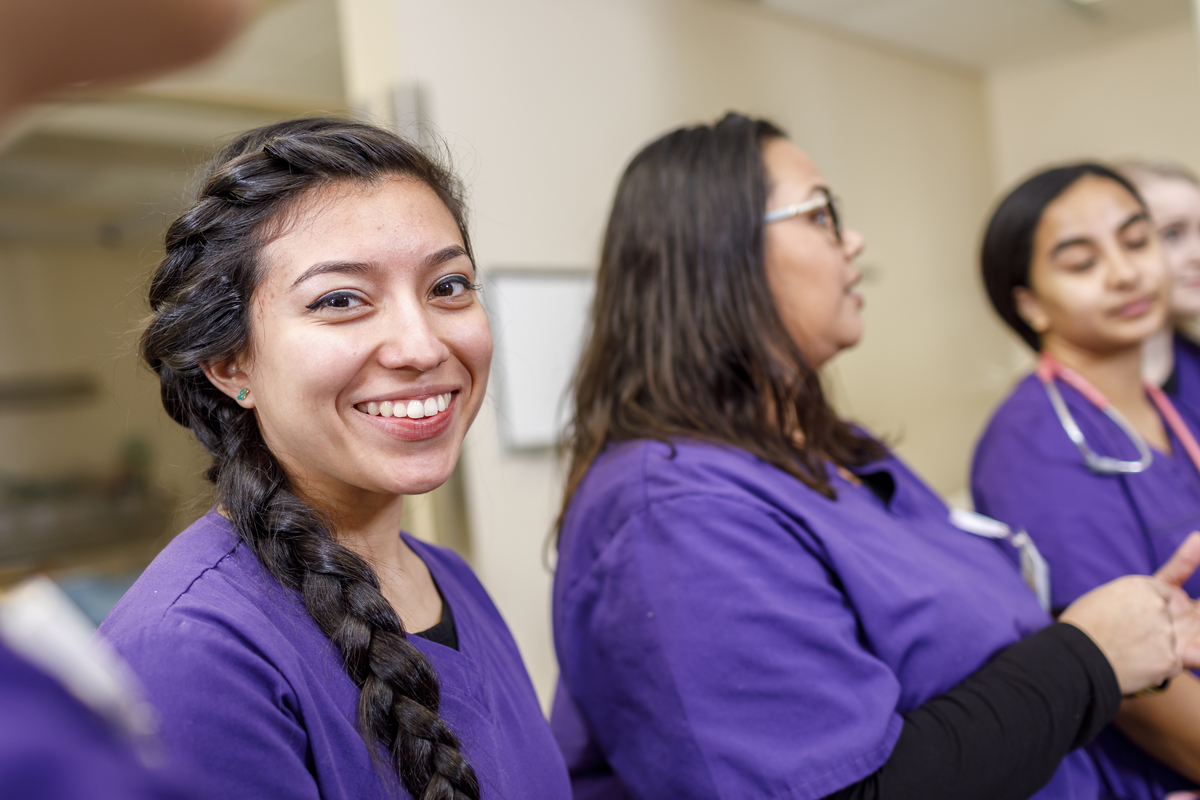 a nursing student smiles at the camera