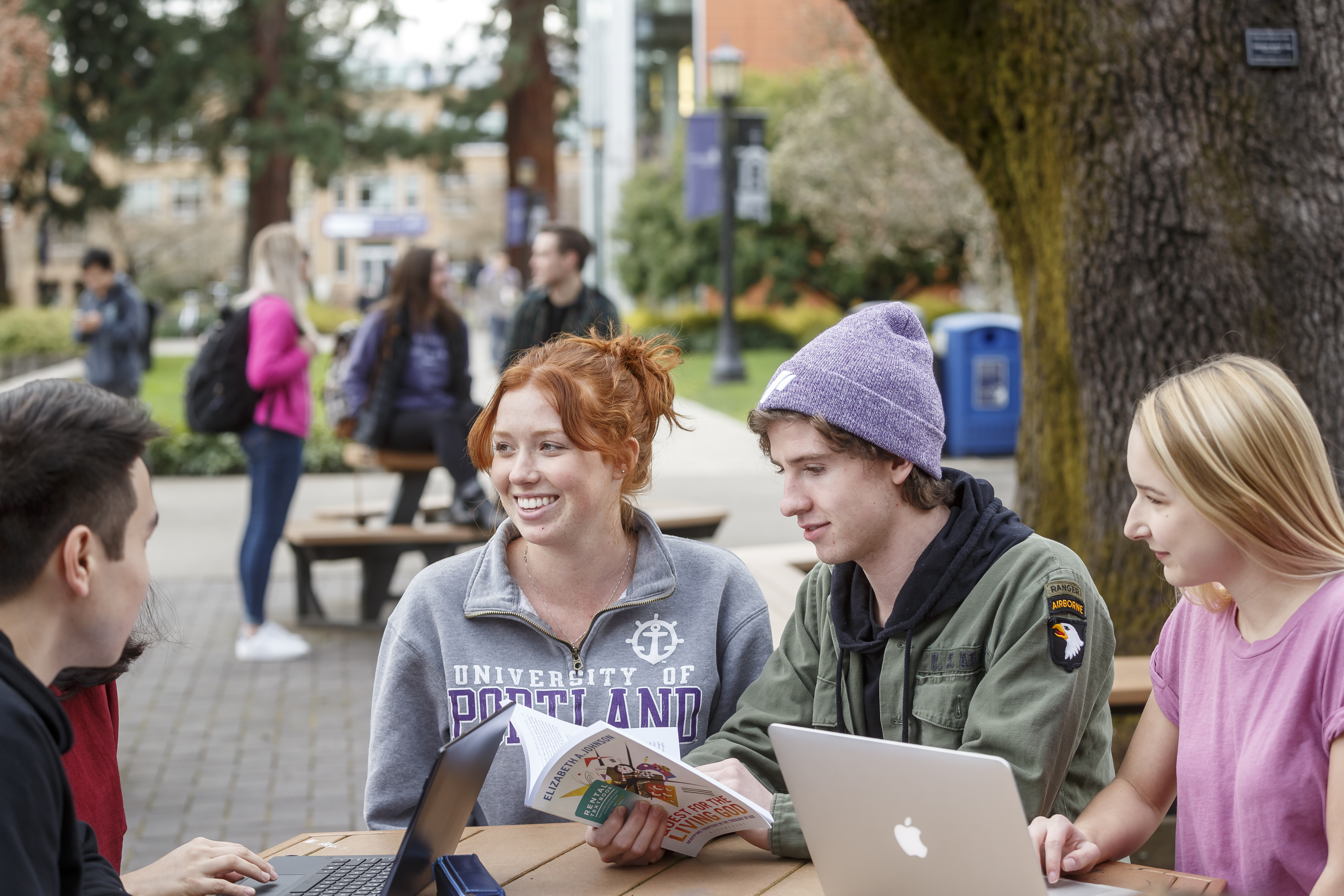 A group of students studying outside