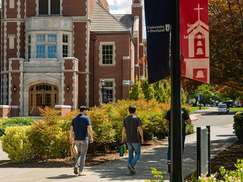 Students walking in front of dundon berchtold hall