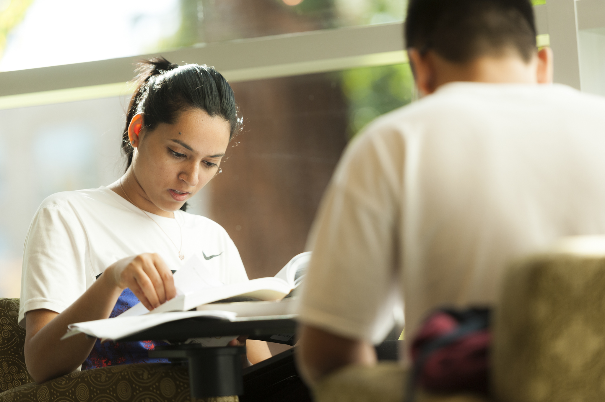 A student reading in the Clark Library