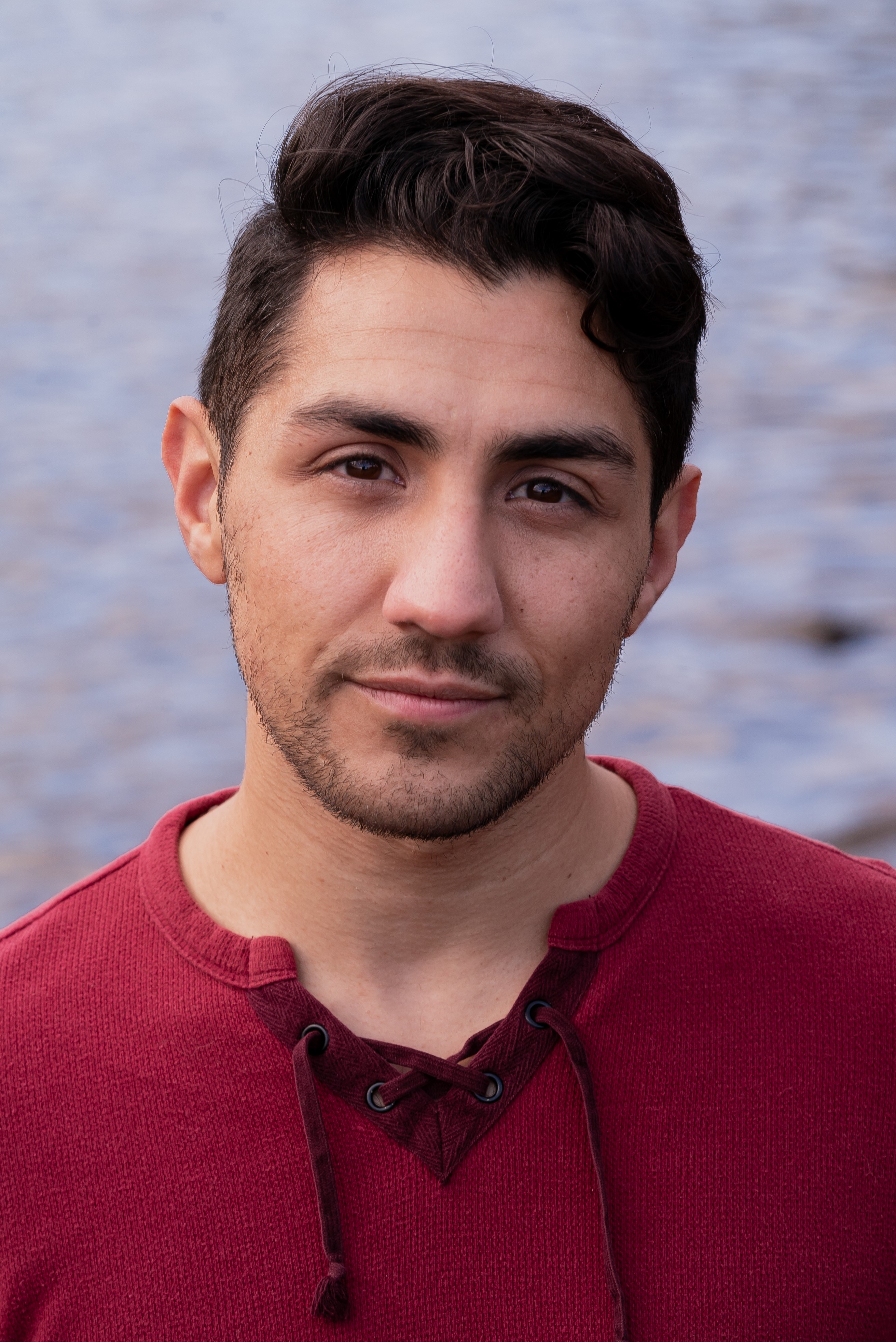 Matt Sepeda, a Latino man smiling to camera