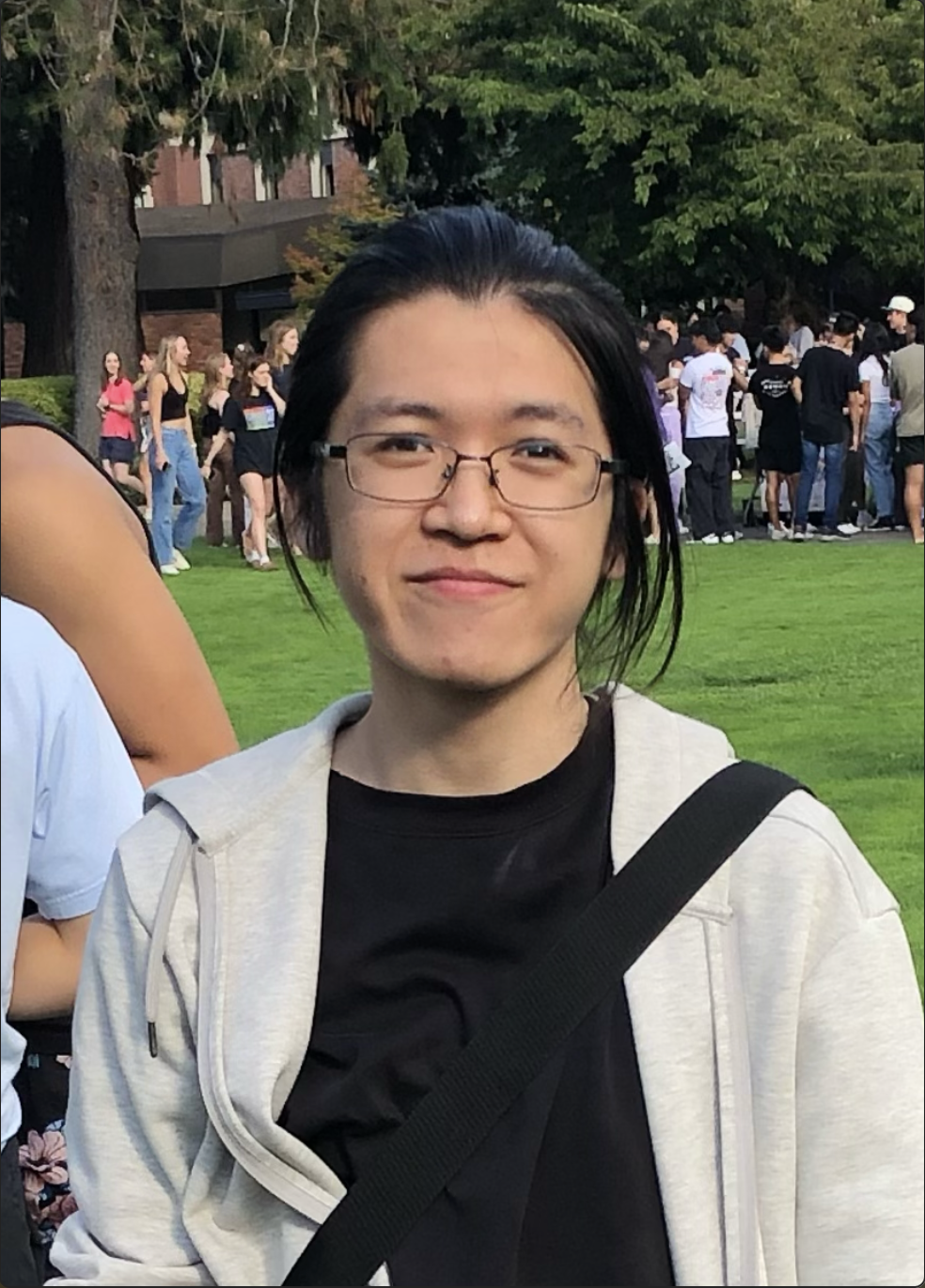 A photo of Yudai Endo, a young student wearing glasses